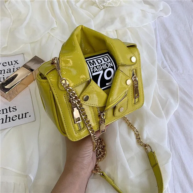 "Stylish T-BOO PU Leather Motorcycle Shoulder Bag with Chain Accent and Rivet Detailing"